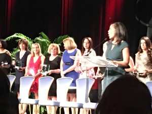 Kathy Benson accepting 50 fastest-growing women-owned/led companies award